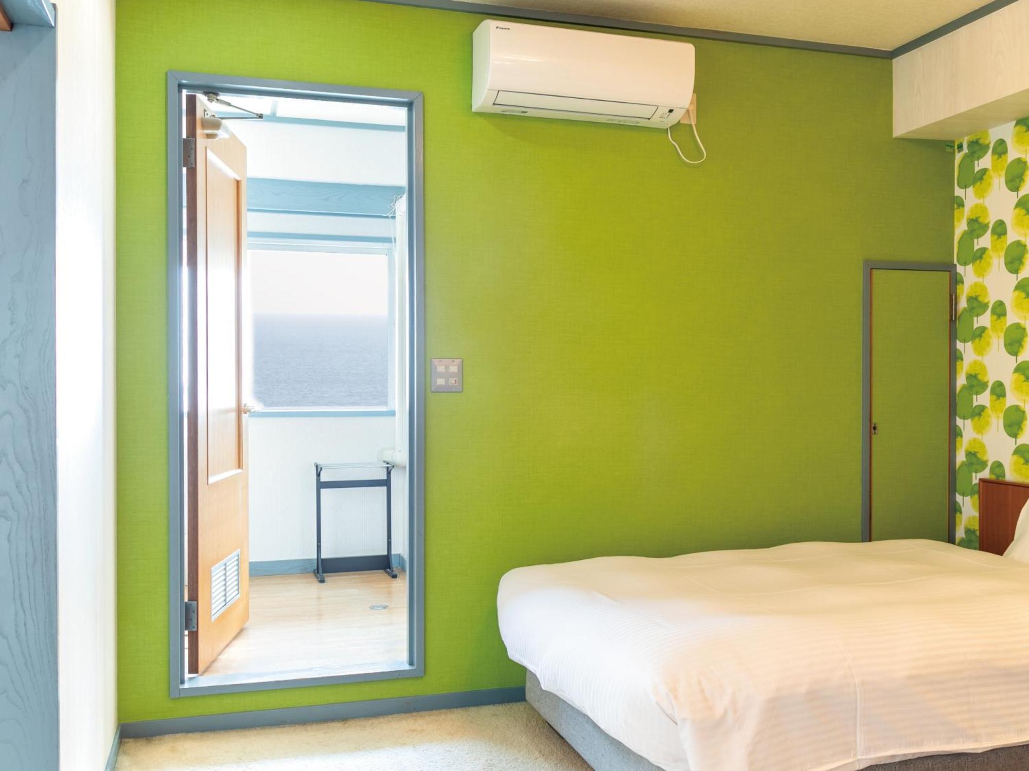 Studio di 34 m² in Appartamento con 1 bagno privato in zona Higashiizu Camera foto