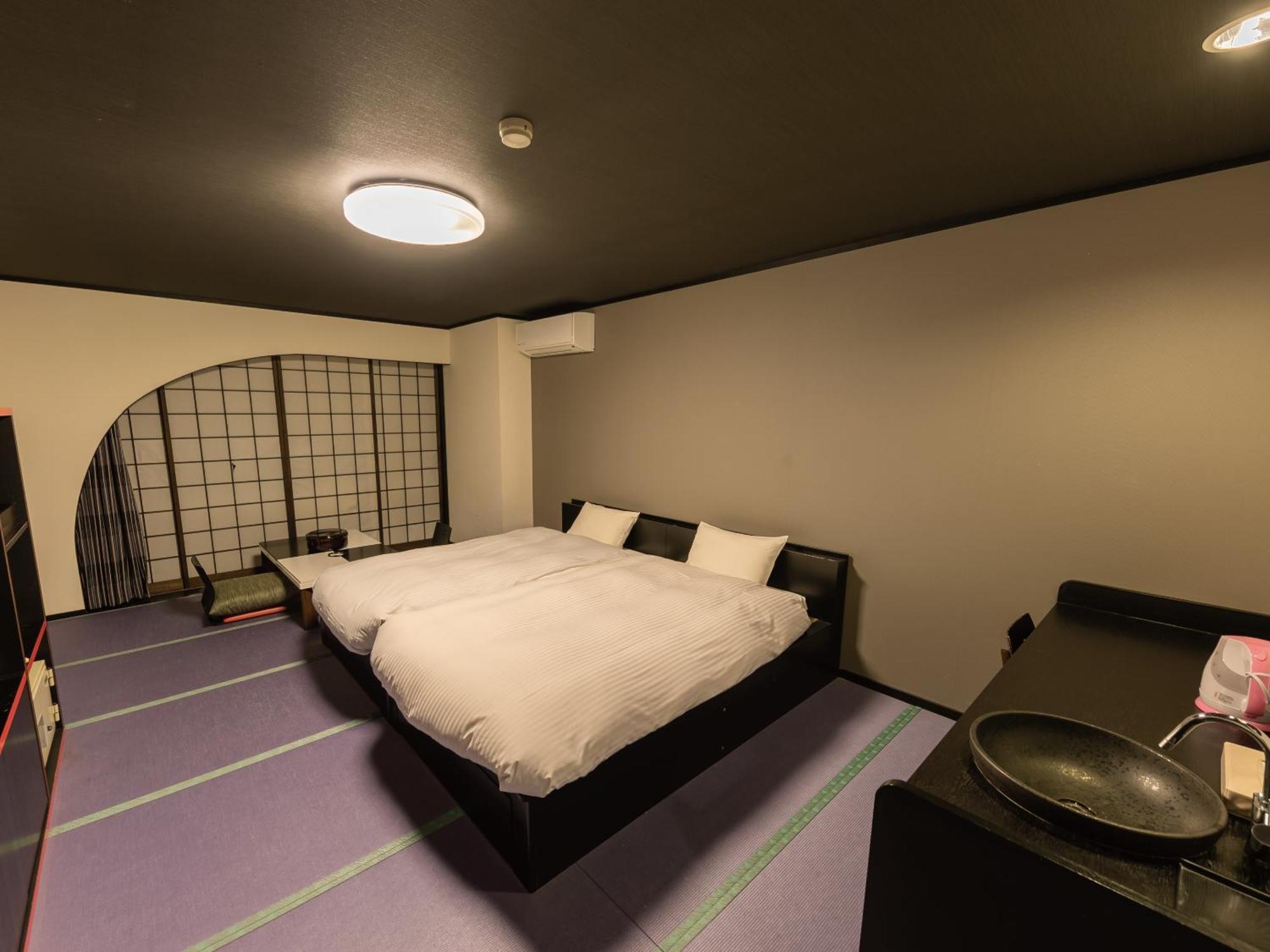 Studio di 34 m² in Appartamento con 1 bagno privato in zona Higashiizu Camera foto
