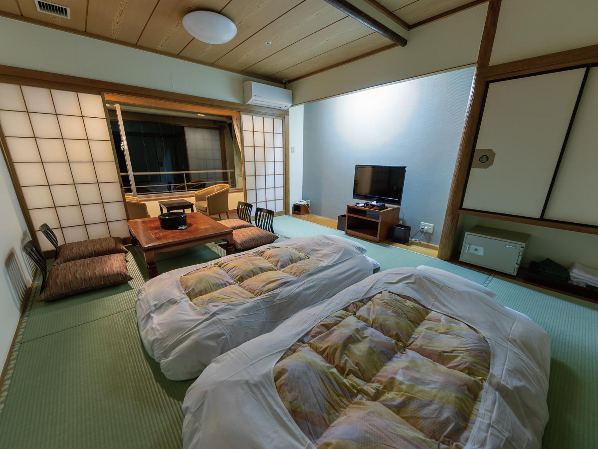 Studio di 34 m² in Appartamento con 1 bagno privato in zona Higashiizu Camera foto